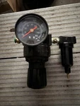 Parker 06R1C00021 Pneumatic Regulator 1/4" Npt 250 Psi W/ 14F17BA Filter. Fixed Price $27.00.