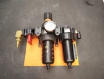 Parker 07E38B18AC Regulator + 12F38EC Filter Pneumatic PS856P Oil Air Complete. Fixed Price $175.00.