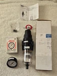 New Old Stock Parker 06E21A13AA Pneumatic Filter Regulator W/ Gage Gauge 150PSI. Fixed Price $139.95.