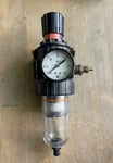 Parker Pneumatics 0430090143 Filter Regulator W/gauge Input 150PSI Output 0-30. Fixed Price $75.00.