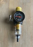 Parker 14E1C00015 Filter Regulator With Pressure Gauge 1/4" Npt. Fixed Price $45.00.