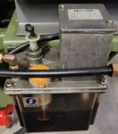 Showa SMA6 1005F Lubrication Pump Reservoir - 2 Liter Volume. Fixed Price $140.00.