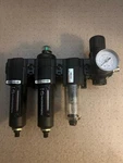 New Norgren Compressed Air Filter-regulator With Two Excellon. Fixed Price $200.00.