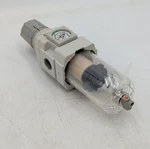 Smc AW30K-N03E-Z-B Filter Regulator With Backflow Function 3/8" Npt W/gauge Used. Fixed Price $35.00.
